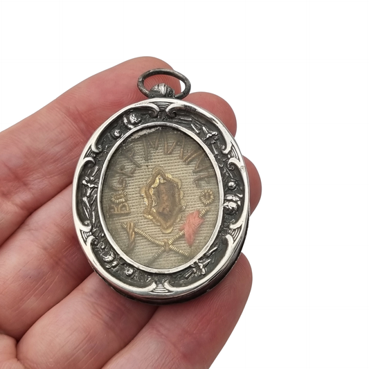 Antique silver reliquary of Blessed Germaine of Pibrac with original wax seal, 19th century