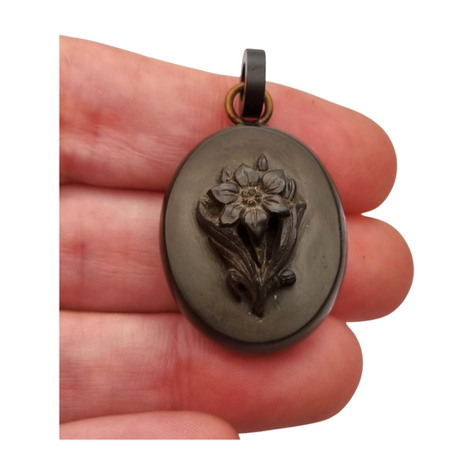 Antique Victorian vulcanite floral locket, circa 1880-1900, mourning jewelry