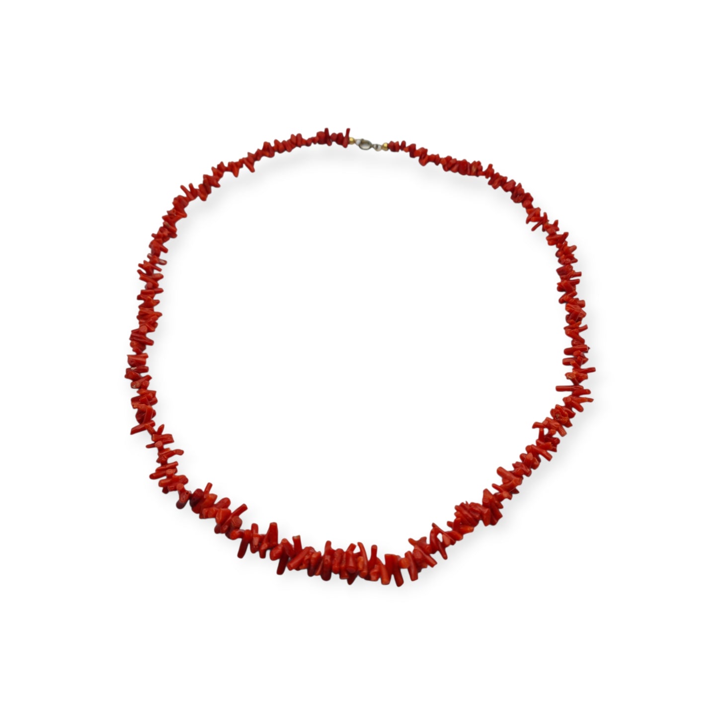 Boho necklace of natural red coral with irregular branches and metal clasp, circa 1970-80