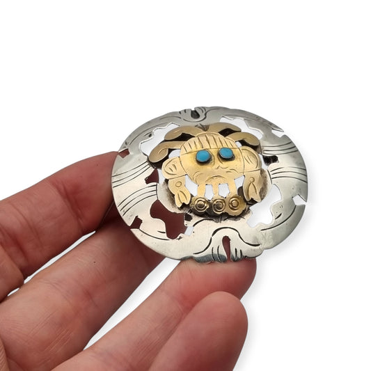 Peruvian 925 silver and 18K gold pendant brooch with pre-Columbian mask and turquoise cabochons, circa 1965–1975