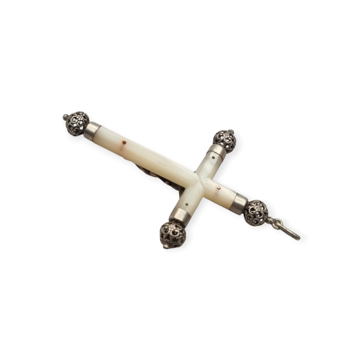 Antique silver and mother-of-pearl hanging crucifix, openwork finials of Neo-Gothic inspiration, Europe, ca. 1900–1930