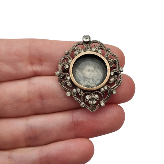 Victorian silver brooch with gold accents, painted miniature, and gemstones, France 1890-1900