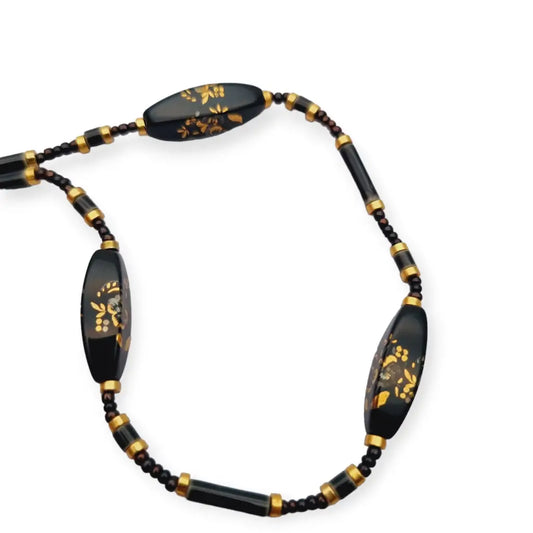 Collar vintage de cuentas vidrio negro con flores doradas años 40 tipo