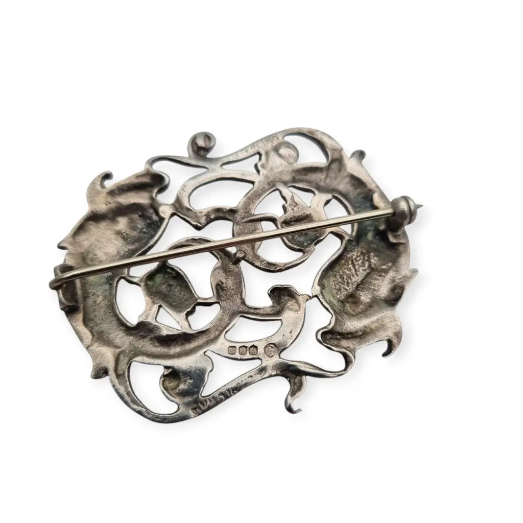 Broche antiguo del signo Piscis en plata de ley circa 1950. Joya simbólica