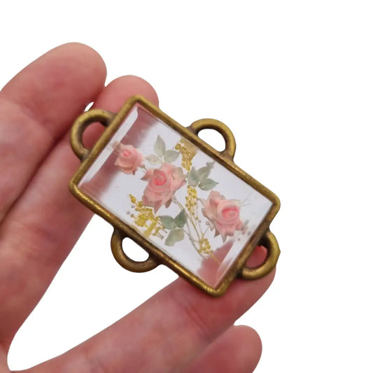 Broche Art Déco rectangular vintage con flores en lucita de los años 40.