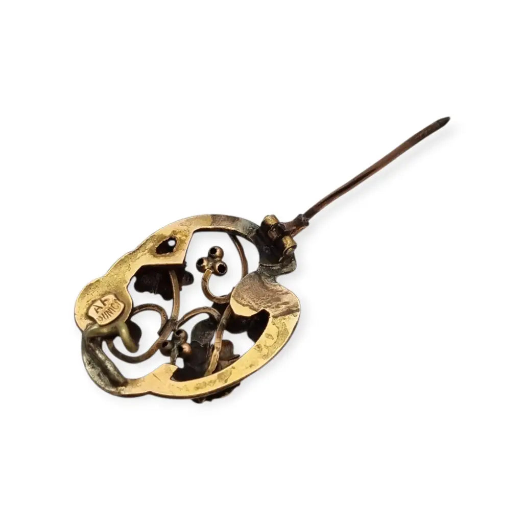 Broche Art Nouveau floral en oro laminado y rosa con granates el sello