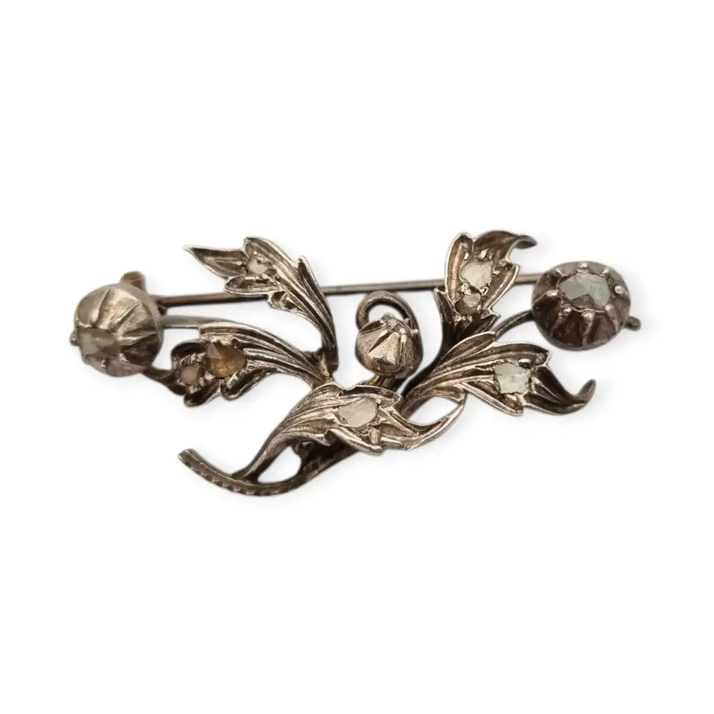 Broche floral victoriano antiguo en plata con diamantes talla antigua