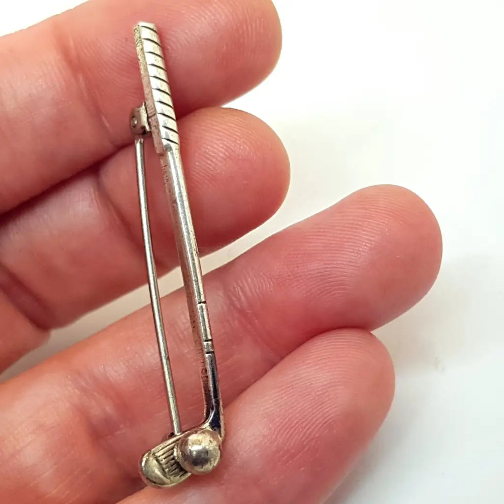 Broche palo de golf plata circa 1980 joyería antigua y vintage.