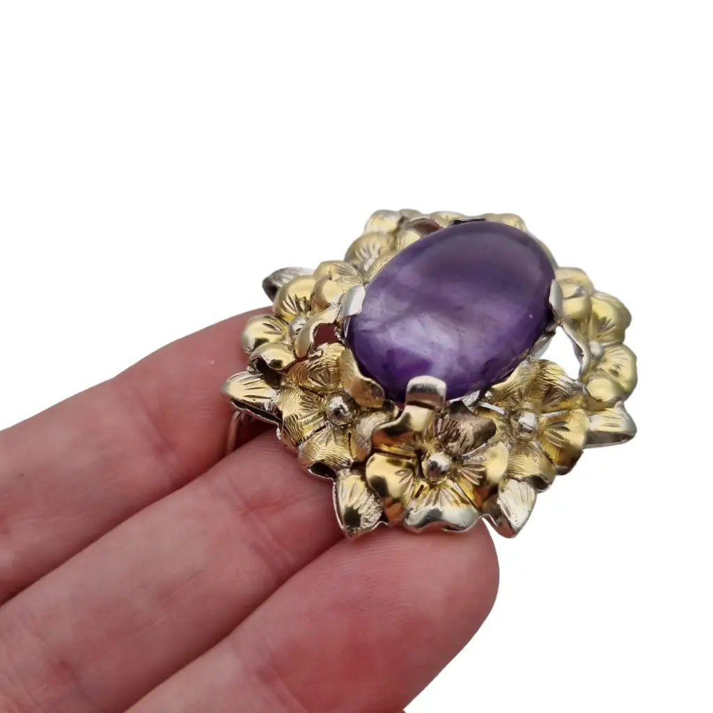 Broche vintage art déco de plata y amatista para mujer con flores.