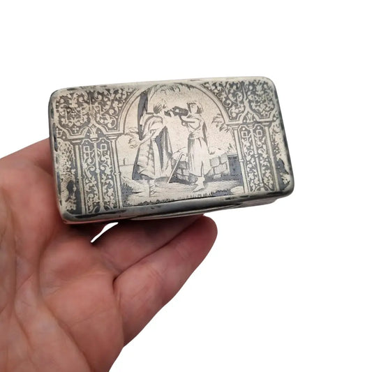 Caja antigua de rapé en plata y niello con escena orientalista grabada. Circa