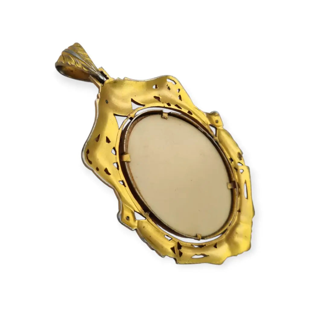 Colgante Art Nouveau de la Virgen década 1910 en celuloide y metal dorado