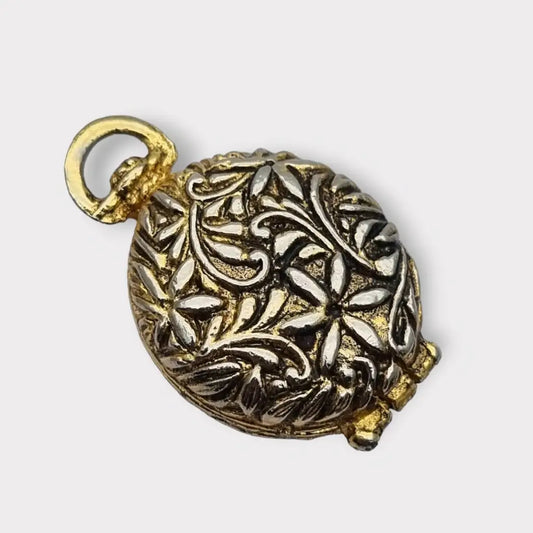 Colgante con foto medallón de oro ojo tigre la marca Hollywood