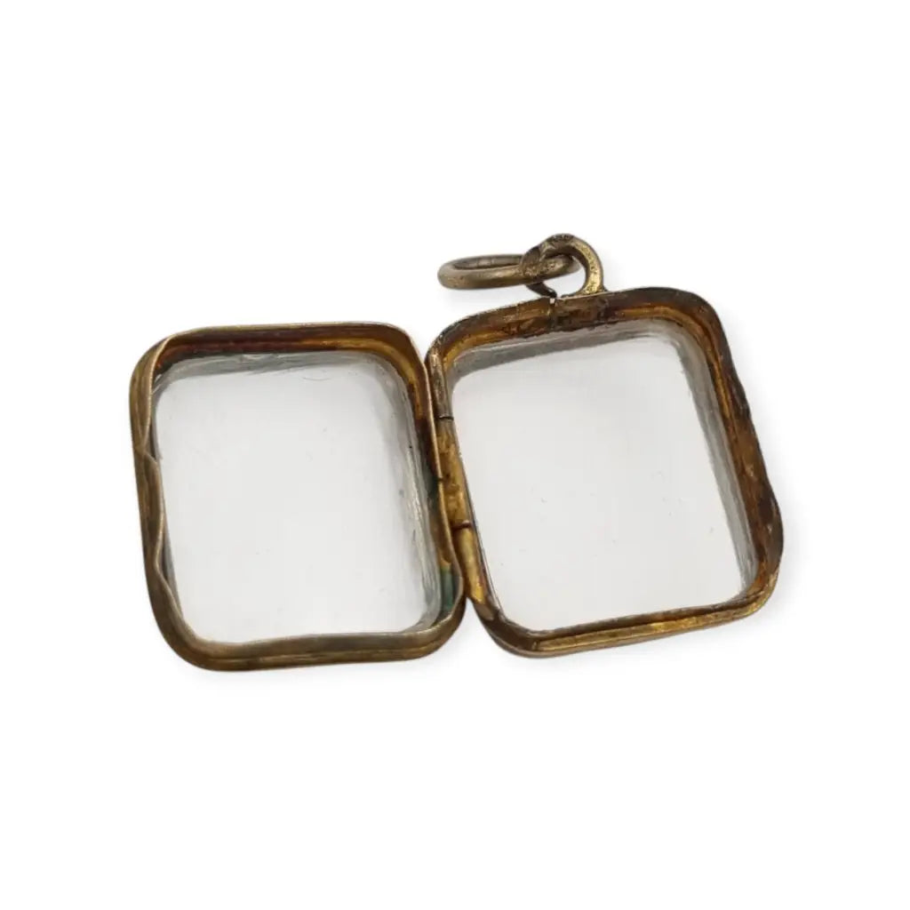 Colgante guardapelo antiguo rectangular doble cristal latón dorado siglo xix–xx.