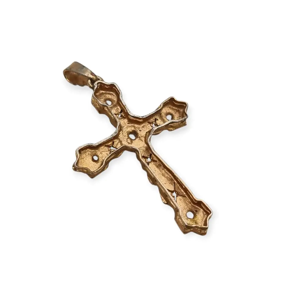 Colgante religioso de cruz Art Decó en metal dorado con pedrería años 20.