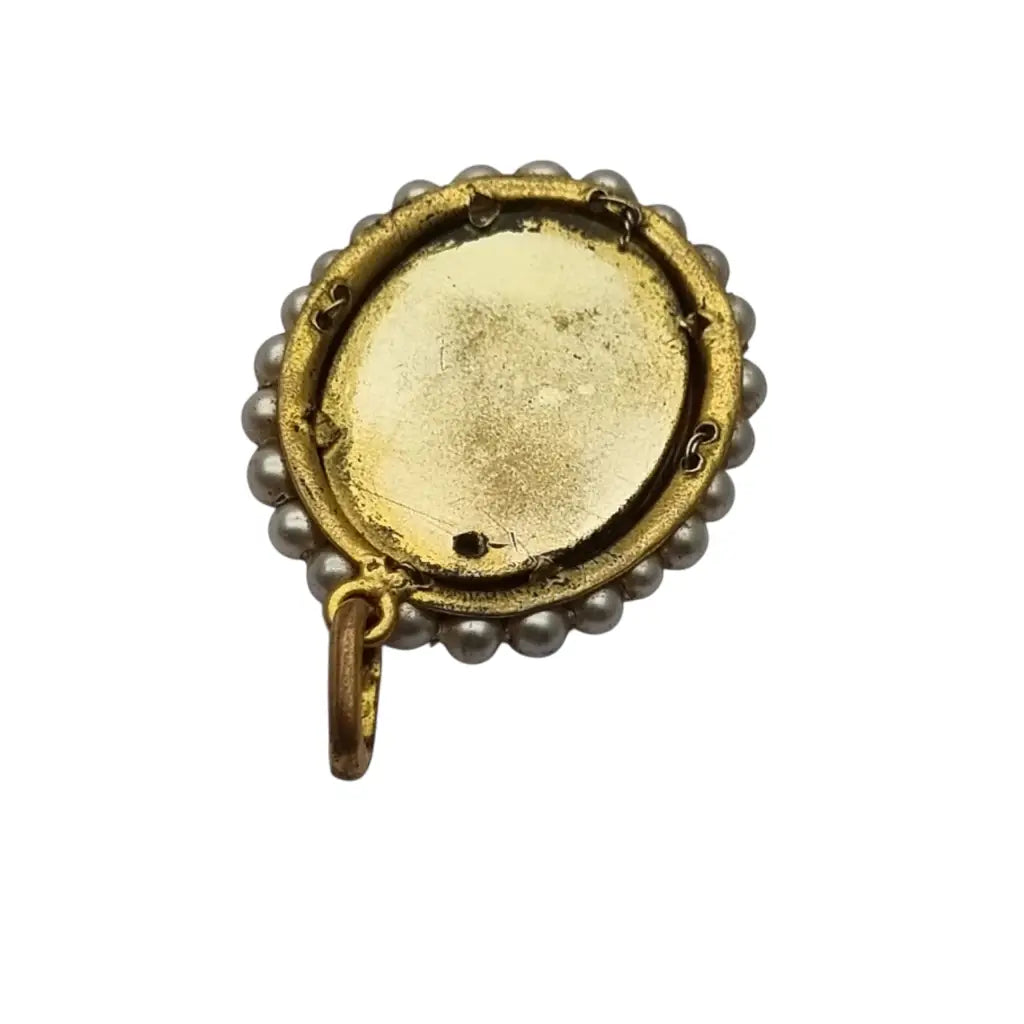 Colgante religioso con una Virgen azul pintada y firmada marco dorado