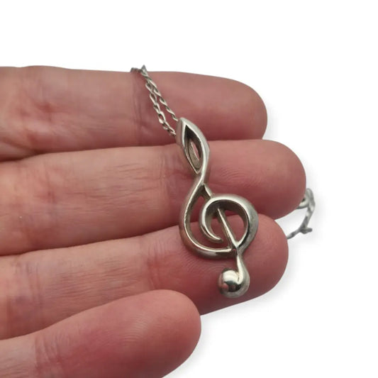 Colgante vintage en plata 925 con forma de clave sol diseño minimalista