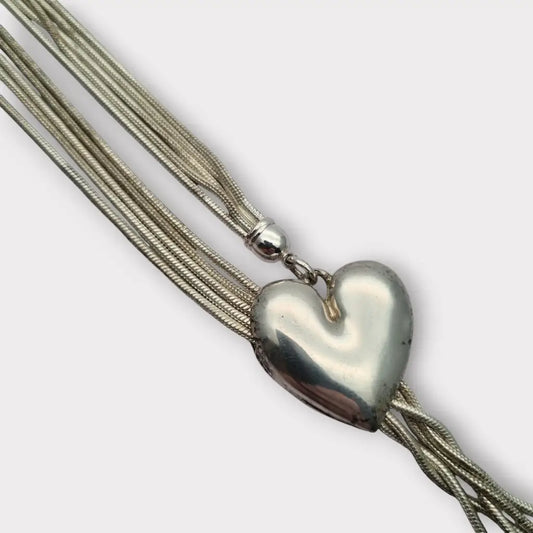 Collar largo vintage de metal plateado con forma corazón deslizante colgante