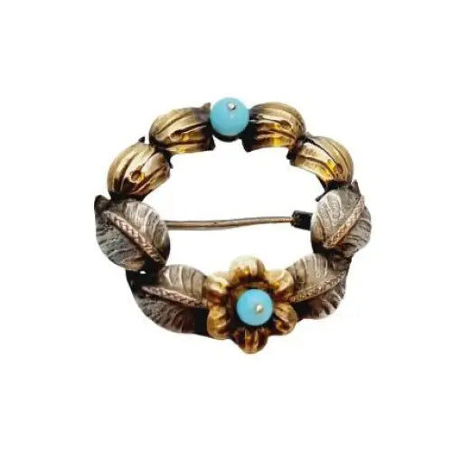 Broche art nouveau de plata oro forma ramo flores. Circa 1920.