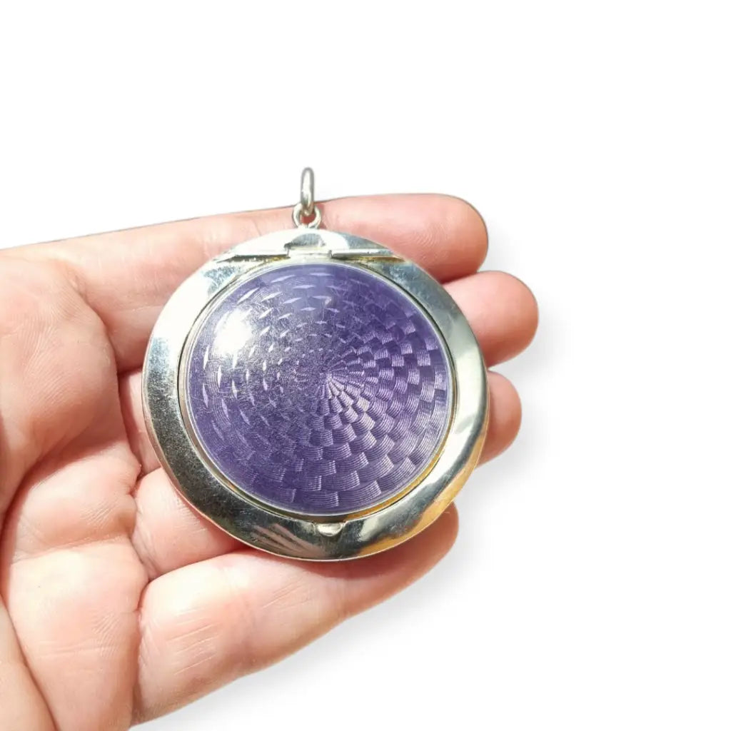 Polvera Art Déco en plata y esmalte guilloché morado Londres 1920 pieza
