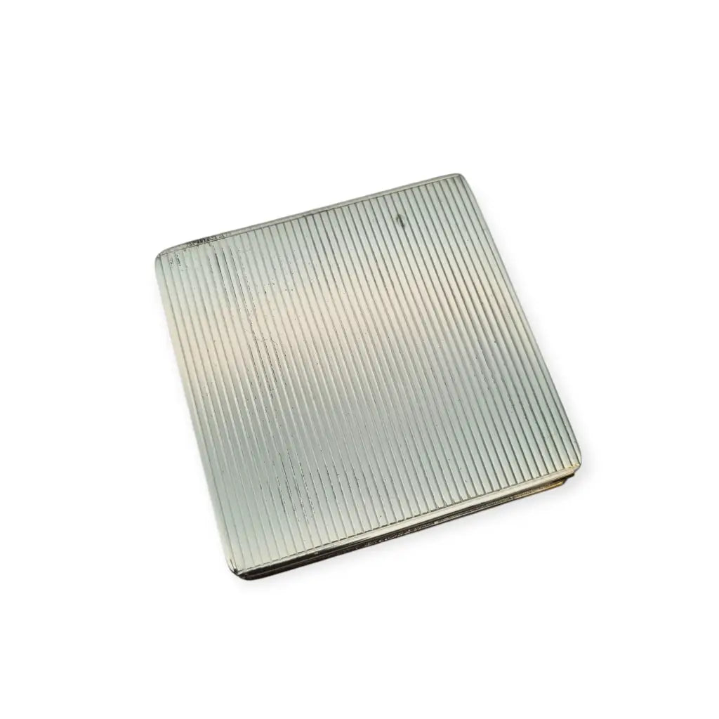 Polvera vintage años 50 en plata 925 con grabado estrellado y espejo interior.