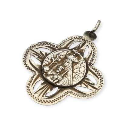 Antique openwork silver medal of the Virgin of Montserrat, Catalan devotional souvenir, ca. 1920-1950