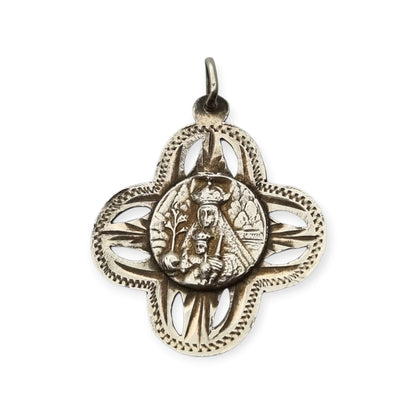 Antique openwork silver medal of the Virgin of Montserrat, Catalan devotional souvenir, ca. 1920-1950