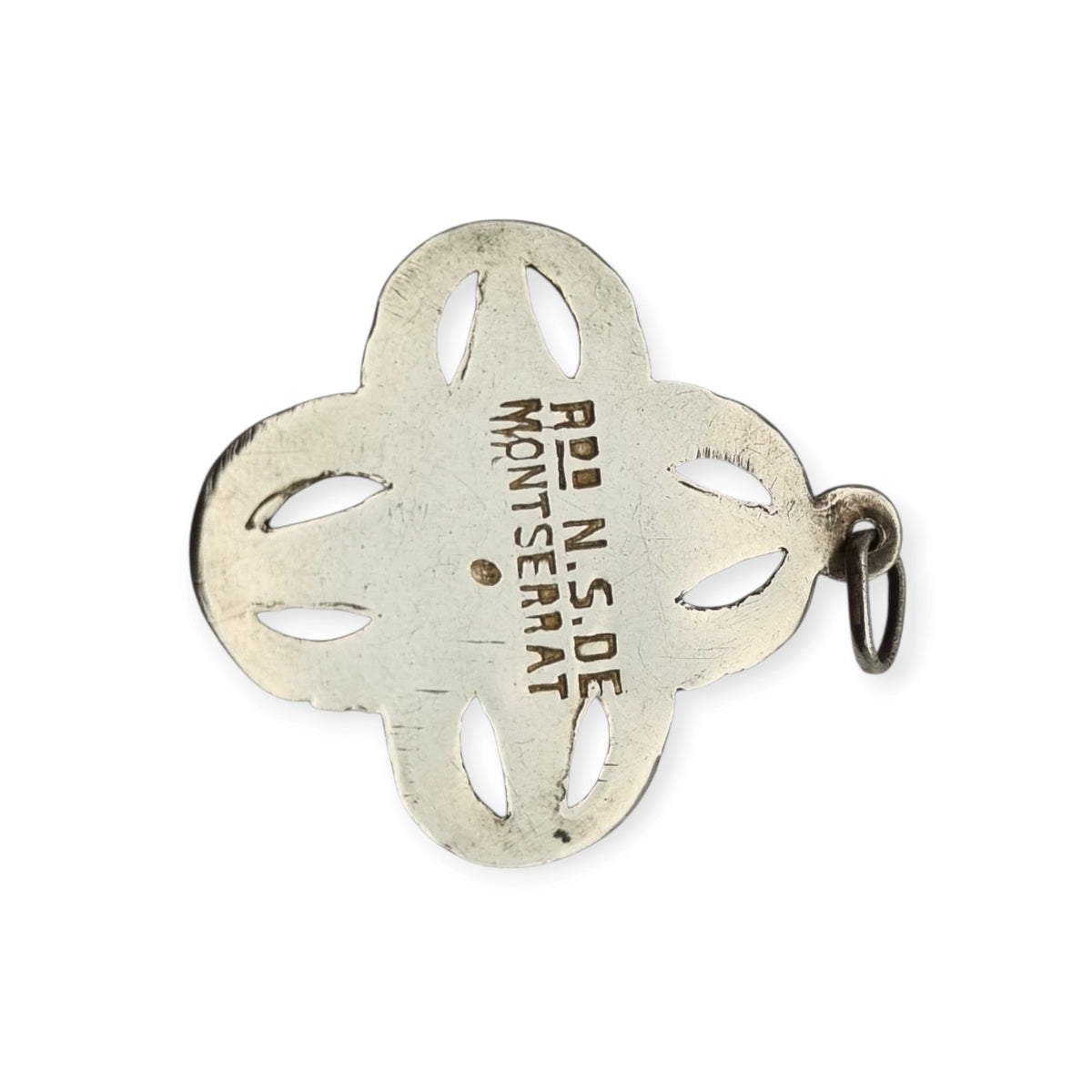 Antique openwork silver medal of the Virgin of Montserrat, Catalan devotional souvenir, ca. 1920-1950