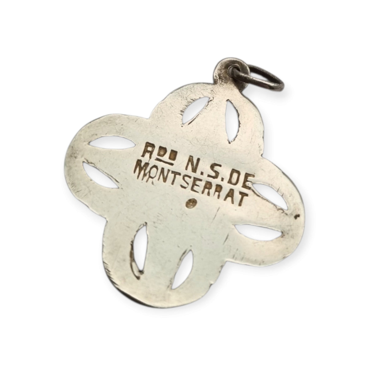 Antique openwork silver medal of the Virgin of Montserrat, Catalan devotional souvenir, ca. 1920-1950