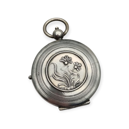 Guardapelo Art Nouveau antiguo de plata 800 con doble portarretrato, grabado floral y piedra rosa, ca. 1900
