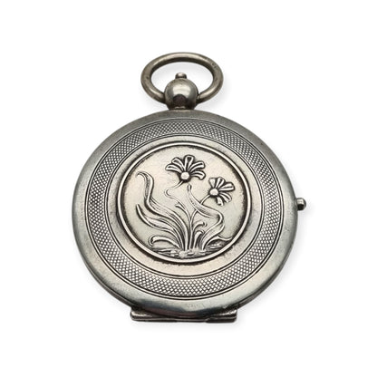 Guardapelo Art Nouveau antiguo de plata 800 con doble portarretrato, grabado floral y piedra rosa, ca. 1900