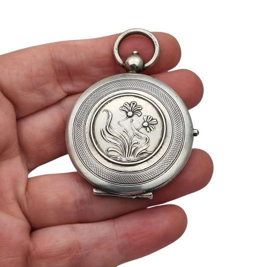 Antique Art Nouveau 800 silver locket with double photo frame, floral engraving, and pink stone, ca. 1900