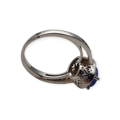 Vintage 925 sterling silver ring with blue stone, Diana style with halo, circa 1990-2000