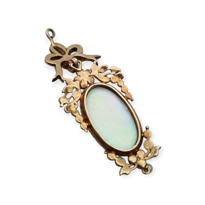Antique winged cherub pendant in Gilt Silver with Enamel, Pearls, and Gems, ca. 18 70–1890