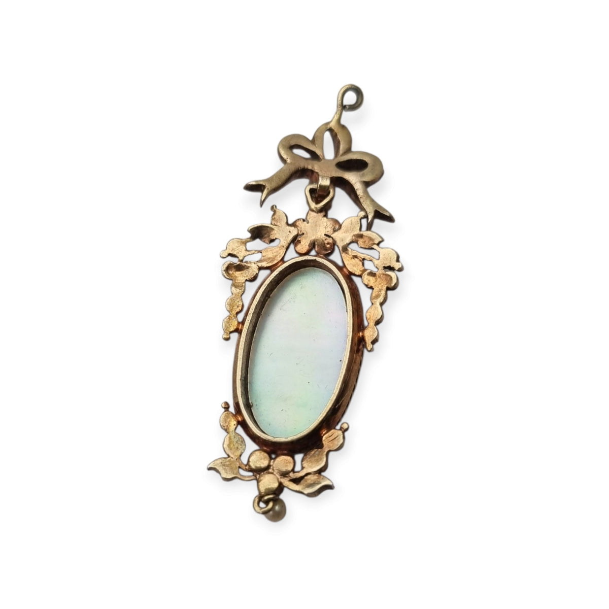 Antique winged cherub pendant in Gilt Silver with Enamel, Pearls, and Gems, ca. 18 70–1890