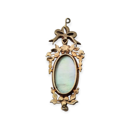 Antique winged cherub pendant in Gilt Silver with Enamel, Pearls, and Gems, ca. 18 70–1890