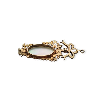 Antique winged cherub pendant in Gilt Silver with Enamel, Pearls, and Gems, ca. 18 70–1890