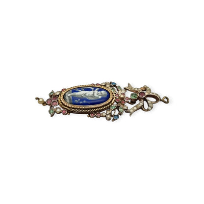 Antique winged cherub pendant in Gilt Silver with Enamel, Pearls, and Gems, ca. 18 70–1890