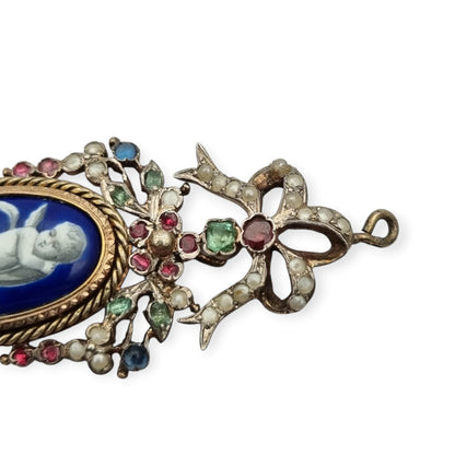 Antique winged cherub pendant in Gilt Silver with Enamel, Pearls, and Gems, ca. 18 70–1890