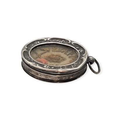 Relicario antiguo de plata de la beata Germana de Pibrac con lacre conservado, siglo XIX