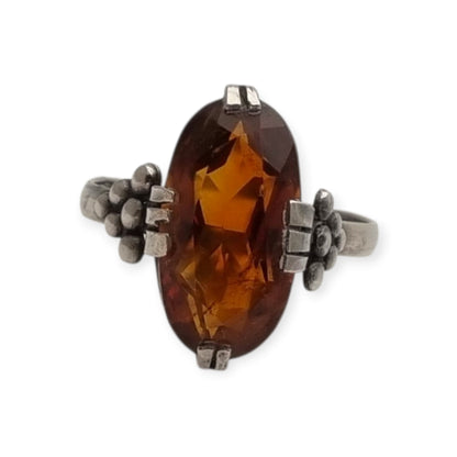 Vintage Art Deco silver ring with cognac-colored glass and geometric decoration, Europe, ca. 1950–1960