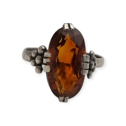 Vintage Art Deco silver ring with cognac-colored glass and geometric decoration, Europe, ca. 1950–1960