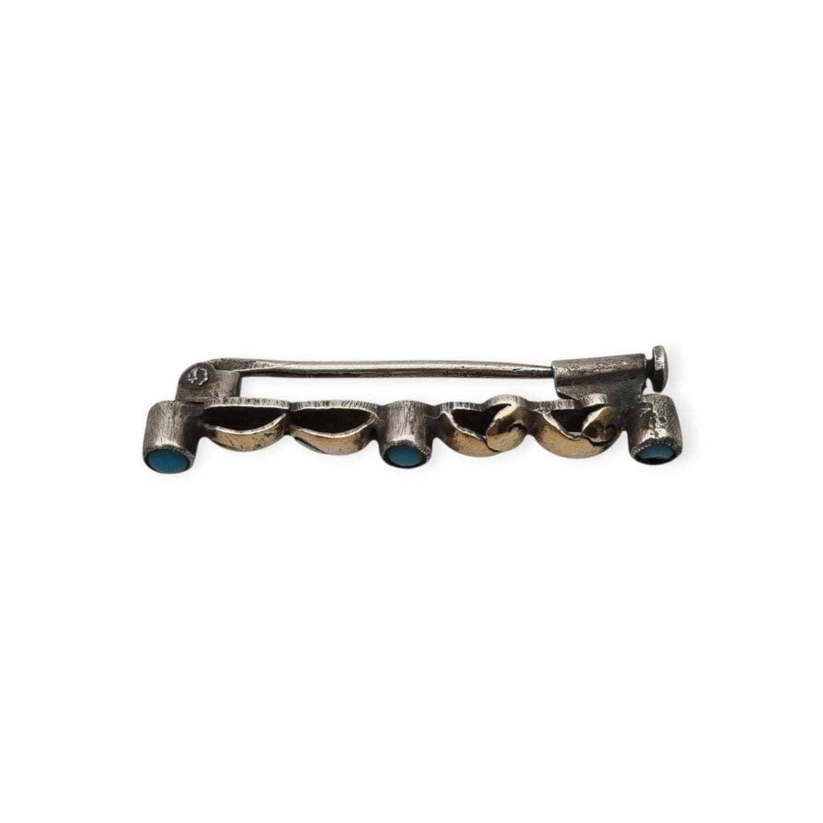 Antique Art Deco silver brooch with gold highlights and blue cabochons, Spain, ca. 1930–1940