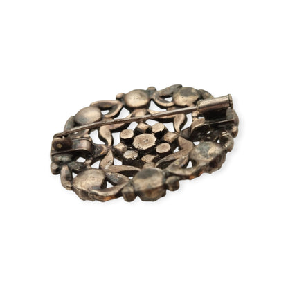 Vintage Art Deco costume jewelry brooch with rhinestones and floral decoration, Hollywood style, Europe, ca. 1940–1950