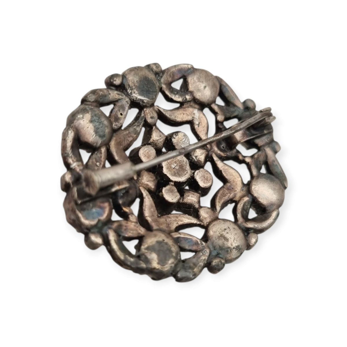 Vintage Art Deco costume jewelry brooch with rhinestones and floral decoration, Hollywood style, Europe, ca. 1940–1950