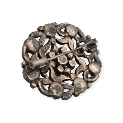 Vintage Art Deco costume jewelry brooch with rhinestones and floral decoration, Hollywood style, Europe, ca. 1940–1950