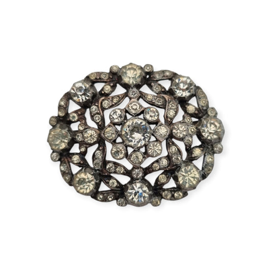 Vintage Art Deco costume jewelry brooch with rhinestones and floral decoration, Hollywood style, Europe, ca. 1940–1950