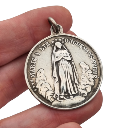 French silver medal of the Immaculate Conception and Sacred Heart, signed Waag, ca. 1880-1905