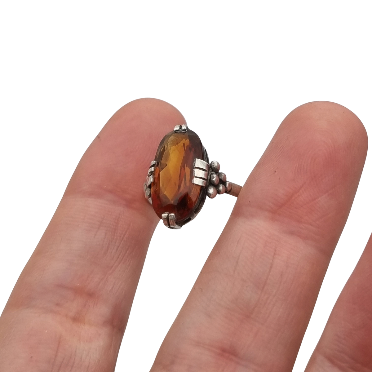 Vintage Art Deco silver ring with cognac-colored glass and geometric decoration, Europe, ca. 1950–1960