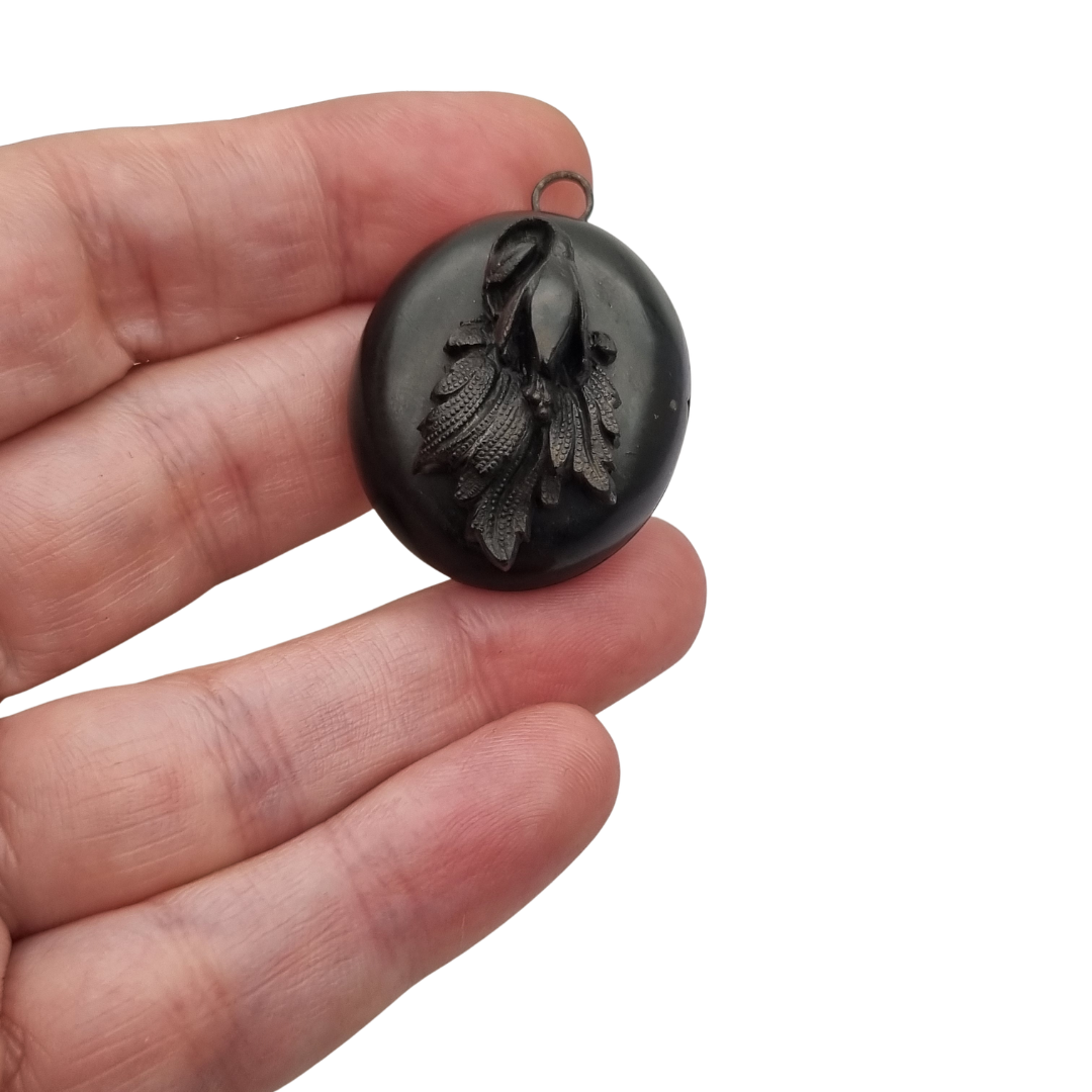 Antique Victorian vulcanite floral locket, circa 1880-1900, mourning jewelry