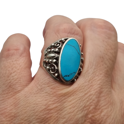 Vintage boho 925 silver ring with blue cabochon and ornamental filigree, circa 1980–1990